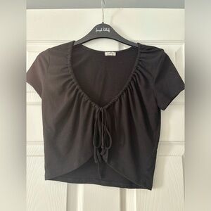 Garage tie front top